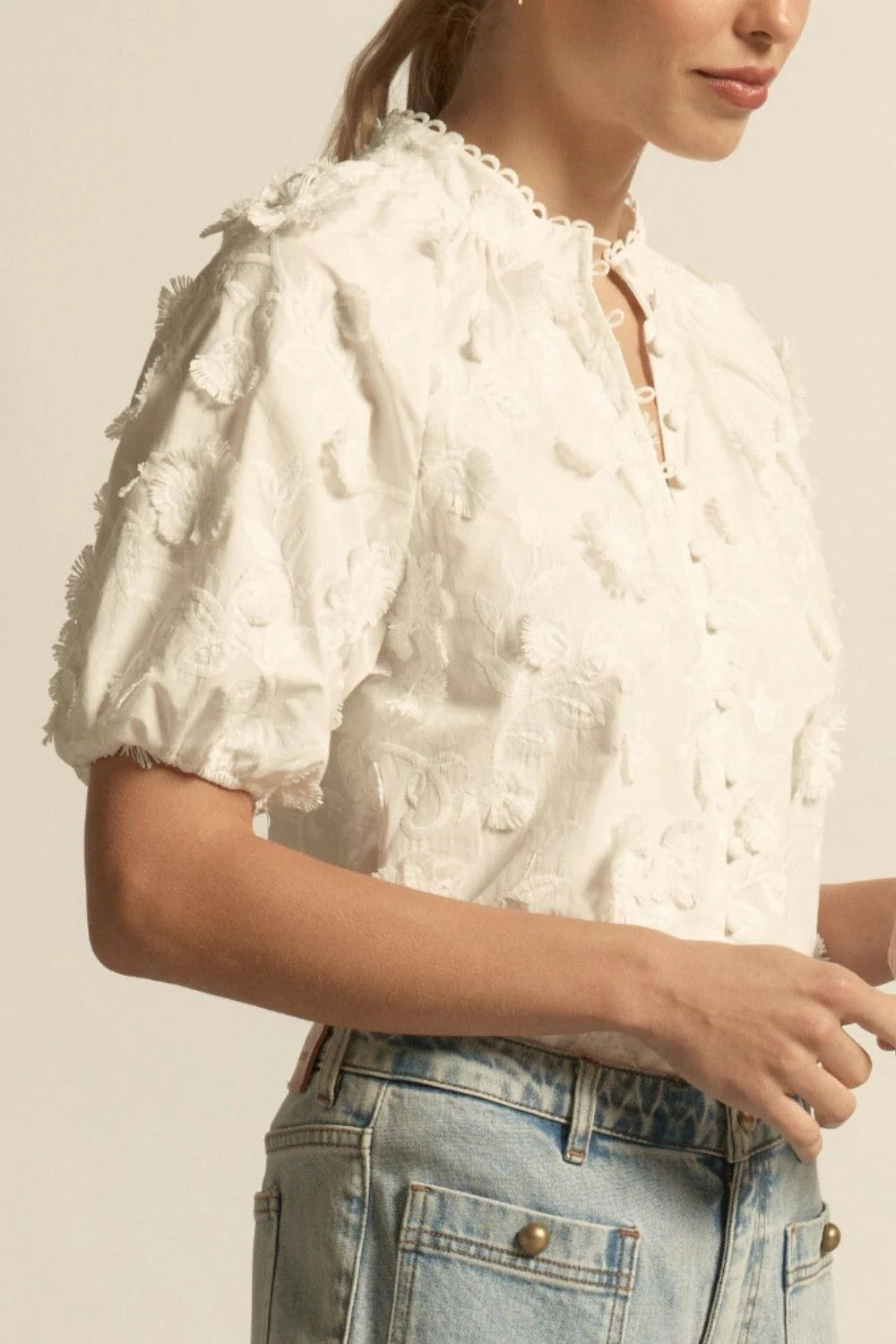 ZOE KRATZMANN | SOLSTICE TOP
crafted in dynamic 3d floral broderie, the solstice top is finished with scalloped lace trims for added charm. a high neck-stand lends structure, while elbow-length blouson sleeves with elasticated cuffs create soft volume. refined and versatile, it’s designed for both everyday wear and occasion dressing.
100% cotton 3D broderie
all-over 3d floral broderie
scalloped lace trims for elevated finish
high neck-stand for structure
elbow-length blouson sleeve with elasticated cuff