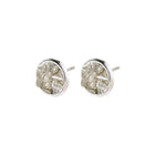 PILGRIM | JOSEFINE EARRINGS

Round silver-plated stud earrings with multiple small grey stones in one setting. The cluster of stones creates a luxurious rustic texture that resembles a small rocky landscape. The raw look is framed by a smooth and gently rounded edge. The interaction of rough and smooth surfaces creates a very fine balance and an aesthetic and harmonious look.