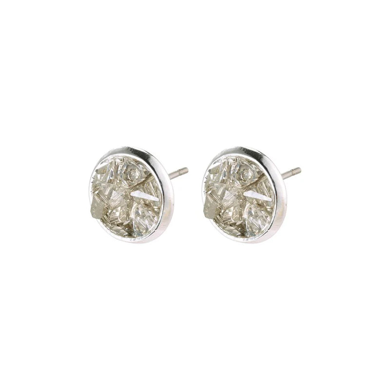 PILGRIM | JOSEFINE EARRINGS

Round silver-plated stud earrings with multiple small grey stones in one setting. The cluster of stones creates a luxurious rustic texture that resembles a small rocky landscape. The raw look is framed by a smooth and gently rounded edge. The interaction of rough and smooth surfaces creates a very fine balance and an aesthetic and harmonious look.