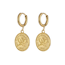 Load image into Gallery viewer, PĀMU Penelope huggies are a unique fusion of contemporary style and New Zealand heritage. Drawing inspiration from a cherished part of New Zealand&#39;s past, these earrings beautifully incorporate the design of the iconic threepence coin, which circulated from 1933 to 1936. Crafted with meticulous attention to detail, these Huggies earrings showcase the threepence coin&#39;s intricate motifs.
