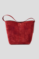 The Esme Suede Tote by Alēo is where luxury meets everyday function. Crafted from a premium mix of soft pebbled calf leather and rich calf suede, this large structured tote adds a sophisticated pop of cranberry and rust to your wardrobe.