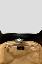 Alēo | LOLA &nbsp;SHOULDER BAG
Large hobo style shoulder bag featuring a spacious interior.
Internal compartments and comfortable wide shoulder strap.
Internal foil embossed signature.
Calf suede leather.

Dimensions
Height: 50 cm
Width: 35.5 cm
Depth: 13 cm

Designed in Ireland.