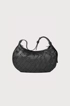 Alēo | SIENNA MINI SHOULDER BAG

Handwoven in soft pebble-grained calf leather, this mini shoulder bag blends artisanal detail with everyday ease. The adjustable strap offers versatile styling, while external and internal zip closures keep your essentials secure.

Soft handwoven box weave mini shoulder bag with adjustable strap options
Single external zip closure with internal zip closure

Dimensions
Height: 18 cm
Width: 31 cm
Depth: 10 cm

Designed in Ireland.