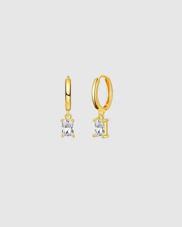 A delicate balance of elegance and shine, the Castel & Co Arina Earrings feature a sleek gold-plated hoop finished with a sparkling diamanté drop. Their refined silhouette catches the light with every movement, making them the perfect piece to elevate both daytime and evening looks.

Material: Stainless steel, Gold plating
Closure Type: Congo
Earring size: 2.2 x 0.4cm
Waterproof and hypoallergenic
Weight: 3g