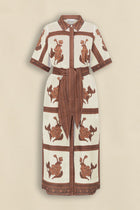 The roam dress is cut in airy linen, finished with thoughtful trim and a side split for relaxed movement. With an exclusive print crafted in luxurious and timeless mocha hues this makes the roam dress perfect for resort styling or everyday luxury.

crisp collar and covered placket deliver refined finish
custom zk exclusive coffee collage print
wide self-tie belt for tailored shape
side split and relaxed fit offer comfort and movement
finished hem and sleeve trim for elevated detail
vacation-ready and trans-