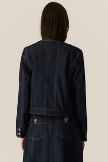 The POL Carsen Denim Jacket is an elevated take on a classic denim jacket. With refined topstitch detailing and a collarless design, we think this just may be the perfect layering piece for Spring.


-Round, collarless neckline.
-Contrast button closure - matches the Carsen Denim skirt and Carsen Pants.
-Full length sleeves - two buttons at the cuff.
-Neater fit through the body.