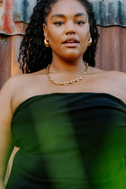 The PĀMU CECE NECKLACE in GOLD, medium boasts a bold and striking design that exudes confidence and style. This eye-catching necklace is designed to elevate your look and become the focal point of any ensemble, adding a touch of edgy sophistication to your wardrobe. The substantial weight of the chain gives it a luxurious feel, while the impeccable craftsmanship ensures a long lasting piece.&nbsp;

PĀMU jewellery is made to be worn everywhere, every day. Our pieces are water proof, sweat proof, ocean proof,