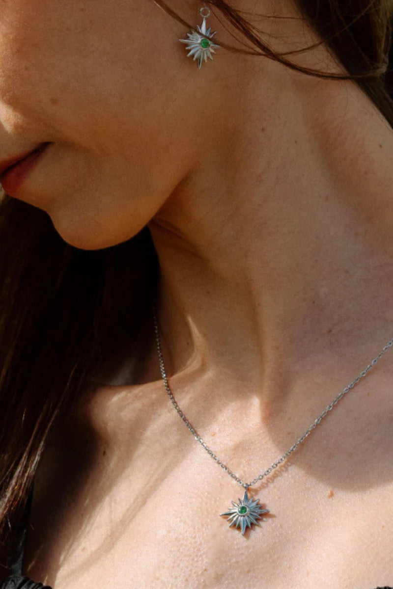 The PĀMU CELESTE NECKLACE. Elevate your style with our Celeste necklace featuring a North Star pendant adorned with a captivating green stone. The North Star symbolises guidance and growth, perfect for any occasion and designed for comfort and long lasting brilliance.&nbsp;

PĀMU jewellery is made to be worn everywhere, every day. Our pieces are water proof, sweat proof, ocean proof, nickel free and hypoallergenic.

Premium Stainless Steel + Stirling silver PVD coating
