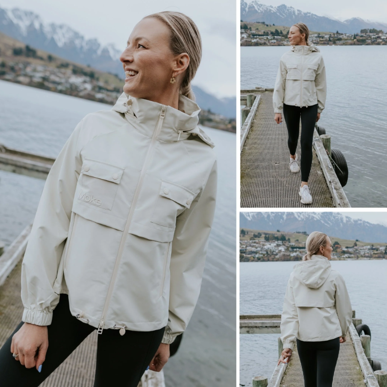 Maggie by Moke women’s short rain jacket with a modern, sporty silhouette. Crafted in a durable matte waterproof fabric with exposed waterproof zip tape for a technical edge. Features a 10,000mm waterproof rating and 5,000g breathability rating for comfortable protection in light to moderate rain. Finished with functional chest pockets and a cinched hem for an adjustable fit. Lightweight, easy to layer, and designed in New Zealand for everyday urban wear.