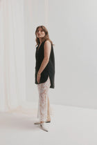 CHAOS &amp; HARMONY | VALOR MULE

Soft and clean, the VALOR MULE in Milk is crafted from recycled leather with a sleek pointed toe. This refined neutral adds a polished touch to everything from workwear to weekend denim.

Milk recycled leather pointed mule
Soft leather lined
Black stack heel / Black rubber outsole
20mm / 0.78 inch heel
Standard fit
We recommend a good leather/suede protectant to protect your shoes
Made in Dongguan, China