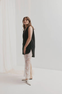 CHAOS &amp; HARMONY | VALOR MULE

Soft and clean, the VALOR MULE in Milk is crafted from recycled leather with a sleek pointed toe. This refined neutral adds a polished touch to everything from workwear to weekend denim.

Milk recycled leather pointed mule
Soft leather lined
Black stack heel / Black rubber outsole
20mm / 0.78 inch heel
Standard fit
We recommend a good leather/suede protectant to protect your shoes
Made in Dongguan, China