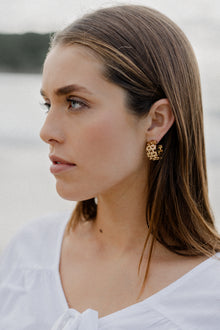 Chain Earrings by Castel & Co are stainless steel chain hoop earrings available in gold-plated and silver-tone finishes. Featuring a bold linked texture for a modern, statement edge while remaining versatile for everyday wear. Measuring 2.2 x 1.2 cm and weighing 11g, with a secure stud closure. Hypoallergenic and waterproof.
Final sale item — not eligible for returns due to hygiene regulations.