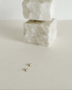 Delicate with a hint of sparkle. These charming Castel & Co Clover studs are adorned with petite diamantes for a subtle shimmer. A timeless style that brings just enough shine for everyday wear or a refined finish to evening looks.

Main material: gold plating, stainless steel
Closure type: stud
Earrings size: 0,5 x 0,5 cm
Inserts: cubic zirconia
Waterproof and hypoallergenic
Weight: 1g