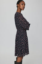 MSCH Evelda dress is a feminine and floral dress, in a viscose lightweight outer layer with a black pettycoat. The dress features a long sleeve with a wide cuff, a simple round neckline and an elastic at the waist. There are small buttons at the front of the dress, allowing you to choose whether you want it more open at the chest or fully closed.

Fitting
This dress has a regular fit. The model is 173cm and wears a size S.

Composition
100% Viscose