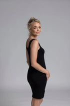 The NES Lattice Slip is a must-have essential for every wardrobe, crafted from a comfortable, non-see-through stretchy knit fabric. This versatile piece can be worn as an undergarment for smooth layering or styled as a top for a chic, effortless look. Featuring fine lattice strap detailing and a reversible design, it offers two stylish options in one. Perfect for layering under dresses, shirts, or jackets,