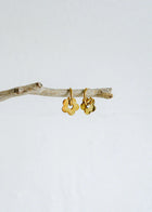 Playful, delicate, and full of charm—the Castel & Co Daisy Earrings in gold bring a fresh, whimsical touch to any look. With their dainty floral design and radiant gold finish, they add just the right amount of sweetness and sophistication. Perfect for everyday wear or as a subtle statement, these earrings are a little ray of sunshine for your jewellery collection.

Main material: gold plating, stainless steel
Closure type: congo
Earrings size: 1,5 x 1,5 cm
Waterproof and hypoallergenic
Weight: 7g