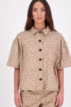 The N-E-S Demi Shirt is your ultimate summer must-have, blending a utilitarian edge with everyday versatility. Designed as a short-sleeve, boxy-fit shacket, it features a button-down front, single breast pocket, and elbow-length sleeves. Wear it open or closed—perfect for layering or styling solo through the warmer months.

Our model is 174cm and wear a XS/S (8-10)

Composition: Cotton, lycra

Designed and Made in New Zealand