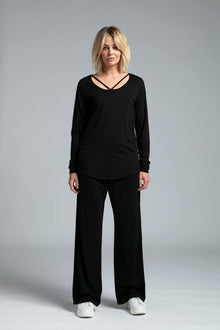 The NES Lounge Pant is the ultimate blend of comfort, warmth, and style. Designed with a wide flat front yoke and an elasticated back waistband, these pants offer a relaxed fit that moves with you. The side-angled pockets add a functional touch, while the straight leg creates a laid-back yet flattering silhouette. Perfect for lounging, casual outings, or traveling in style, the NES Lounge Pant is your go-to for easy, effortless comfort all day long.