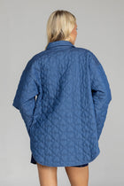 Meet the Blak Frozen Embrace Jacket in denim blue, a premium piece featuring distinctive heart quilting that instantly elevates your style. Crafted from quality cotton with a flattering relaxed fit and convenient dome closures. The trendy drop shoulders and hidden pockets add both fashion appeal and functionality. Expertly finished with bound edges and a curved hem—this versatile essential works for any occasion, making it your smartest wardrobe investment this season.

Fabric composition - Quilted Poly