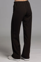 The NES Ginnie Pant is a stylish update to our top-selling Gin Pants, now featuring a pin stitch pleat down the front legs for an elongated, flattering silhouette. With a classic cut that’s easy to dress up or down, these pants are perfect for both work and everyday wear. The centre leg pin stitch detailing adds a touch of sophistication, while the flat front and covered elasticated back provide a comfortable, secure fit. The flattering angled panel at the front enhances the shape, and the full-length strai