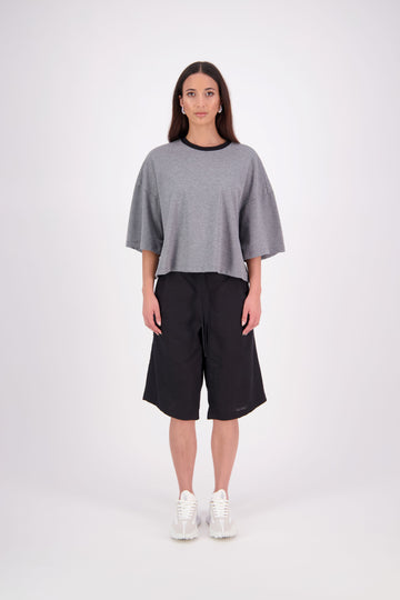 The N-E-S Rita Short is an easy update to our classic Gin Short, crafted in a breathable linen-cotton blend. Featuring a single front leg pleat for subtle shape, angled front pockets, and an elasticated back waistband for comfort. A decorative front drawcord adds detail, with a length finishing just below the knee—perfect for relaxed yet polished summer dressing.

White colourway has a 1/2 liner in a cotton voile
Our model is 174cm and wear a XS (8)
Composition: Linen Cotton
Designed and Made in New Zealand