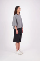The N-E-S Rita Short is an easy update to our classic Gin Short, crafted in a breathable linen-cotton blend. Featuring a single front leg pleat for subtle shape, angled front pockets, and an elasticated back waistband for comfort. A decorative front drawcord adds detail, with a length finishing just below the knee—perfect for relaxed yet polished summer dressing.

White colourway has a 1/2 liner in a cotton voile
Our model is 174cm and wear a XS (8)
Composition: Linen Cotton
Designed and Made in New Zealand