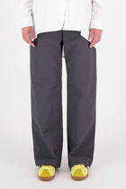 The N-E-S Gin Pants are a best-selling essential, designed to flatter all body shapes with a clean, classic cut. Featuring a flat front, elasticated back, and angled side pockets, they blend comfort and polish effortlessly. Made from a cotton blend, cool-to-the-touch, they're perfect for work, travel, or everyday wear. Whether dressed up or down, the Gin Pants are your go-to for timeless style and all-day ease.

Our model is 174cm and wear a XS (8)

Composition: cotton nylon
Designed and Made in New Zealand