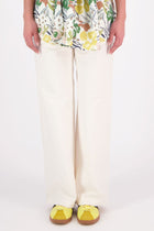 The N-E-S Gin Pants are a best-selling essential, designed to flatter all body shapes with a clean, classic cut. Featuring a flat front, elasticated back, and angled side pockets, they blend comfort and polish effortlessly. Made from a cotton blend, cool-to-the-touch, they're perfect for work, travel, or everyday wear. Whether dressed up or down, the Gin Pants are your go-to for timeless style and all-day ease.

Our model is 174cm and wear a XS (8)

Composition: cotton nylon
Designed and Made in New Zealand