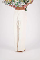 The N-E-S Gin Pants are a best-selling essential, designed to flatter all body shapes with a clean, classic cut. Featuring a flat front, elasticated back, and angled side pockets, they blend comfort and polish effortlessly. Made from a cotton blend, cool-to-the-touch, they're perfect for work, travel, or everyday wear. Whether dressed up or down, the Gin Pants are your go-to for timeless style and all-day ease.

Our model is 174cm and wear a XS (8)

Composition: cotton nylon
Designed and Made in New Zealand