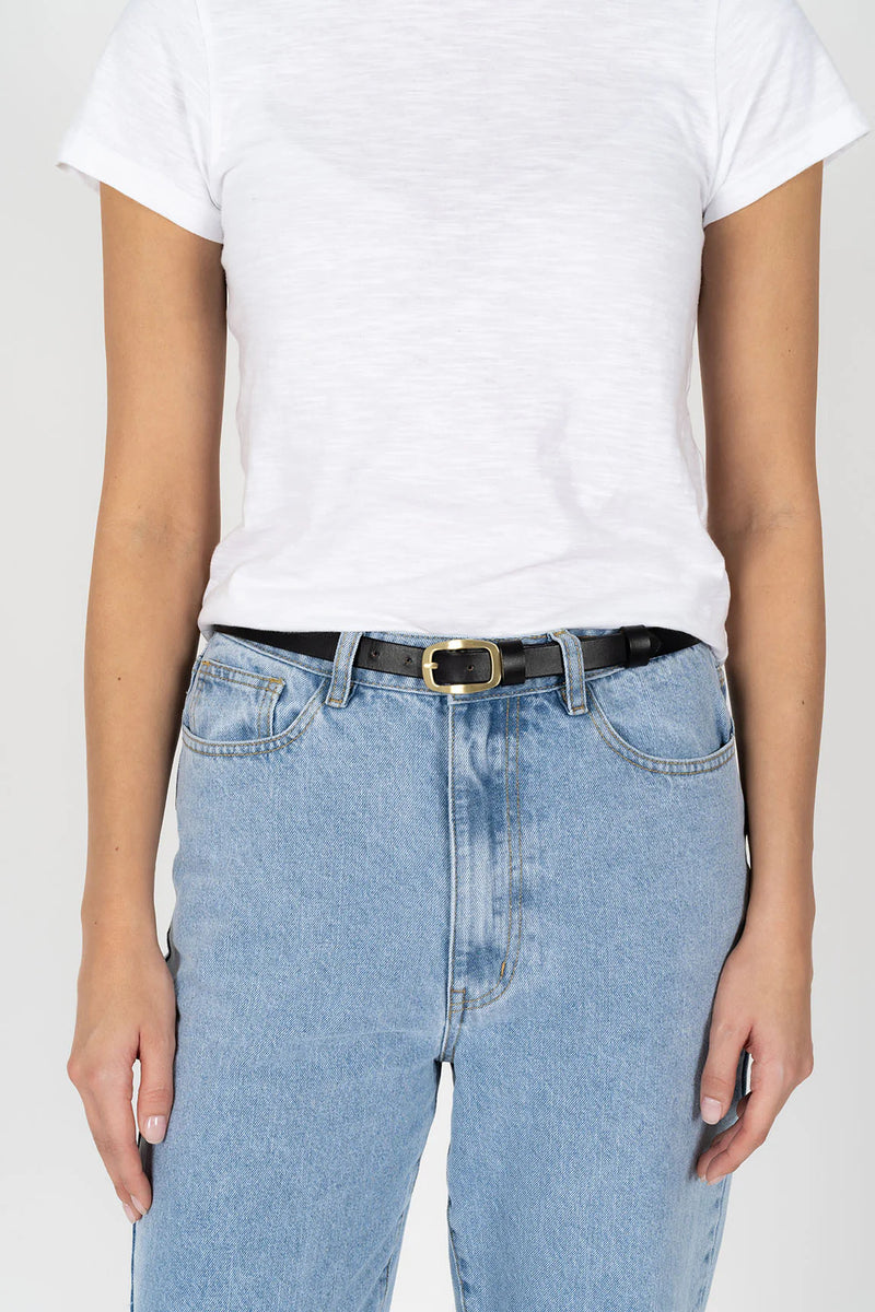 HUMIDITY LIFESTYLE -  TWIGGY BELT AVAILABLE IN BLACK & COCOA.
A timeless belt crafted with 100% smooth leather, double leather keeper and rounded brass buckle.
100% leather.
Smooth leather strap.
Brass buckle.
Designed to be worn at waist.
Adjustable - 7 holes.
Responsibly sourced leather. 