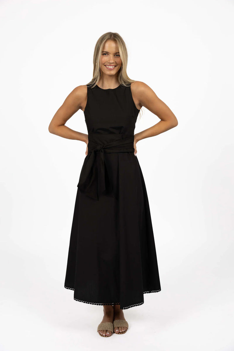 HUMIDTY | WILLA TIE DRESS

Flattering summer maxi dress.
High round-neck with V shaped back.
Fitted bust and waist.
Bra-friendly.
Classic A-line shape.
Elasticated panel for added stretch and comfort.
Invisible zip closure at back.
Wide, long, removable waist tie.
Feature trim on hem.
Soft, lightweight cotton blend.
Maxi-length - sits at the ankle on average height.
This style is true to size and fitted across the bust - elastic in the side of the bodice allows for extra room.