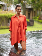 HUMIDITY | GRANDE SHIRT

Oversized, collared shirt.
Feature trim on collar.
Batwing design.
Wide sleeve cuff with gathers and feature trim.
Button closure down the front.
Breastfeeding/pregnancy friendly.
Soft, lightweight cotton blend.
Can be worn as a dress or shirt.
Back curves down longer than front - great tushy coverage.
This style is oversized and roomy throughout - Check the measurements below for fitting guide.