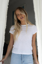 HUMIDITY LIFESTYLE - BENE TEE 
Fitted, cap sleeve, cotton slub t-shirt.
100% cotton, breathable – lightweight.
Sustainable natural fibre.
Fitted design – fabric will give, buy your normal size.
True to size.