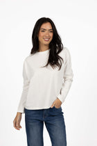 HUMIDITY LIFESTYLE 
Not your average long sleeve. Meet the Wildfire Long Sleeve Tee – your new go-to for cosy, casual dressing. Crafted from our signature ultra-soft cotton, this long sleeve tee is designed for comfort with a fashionable twist. The relaxed, oversized fit and dropped shoulder create an effortlessly cool silhouette that works just as well on the couch as it does out and about.