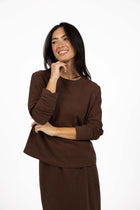 HUMIDITY LIFESTYLE 
Not your average long sleeve. Meet the Wildfire Long Sleeve Tee – your new go-to for cosy, casual dressing. Crafted from our signature ultra-soft cotton, this long sleeve tee is designed for comfort with a fashionable twist. The relaxed, oversized fit and dropped shoulder create an effortlessly cool silhouette that works just as well on the couch as it does out and about.