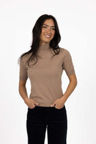 Vera knit top available in black, claret, and hazelnut, crafted from a soft, lightweight cotton/cashmere blend. Designed with a high neckline, sleeves finishing just above the elbow, and ribbed detailing on the neck, cuffs, and hem. The length sits just below the hips, making it ideal for easy tucking and layering. A cosy, non-itch knit perfect for cooler weather, offering a comfortable, true-to-size fit for both work and weekend wear.