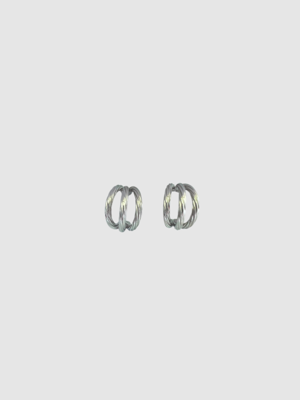 Hadley Hoops by Castel & Co are stainless steel textured hoop earrings available in gold-plated and silver-tone finishes. Designed with a bold yet timeless sculptural silhouette and a light-catching textured finish, they add impact while remaining versatile for everyday wear. Measuring 3 x 1.6 cm with a secure stud closure. Lightweight (9g), waterproof, and hypoallergenic.