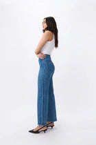 Kireina's again returned to their inspiration – the bold, adventurous '70s - and paid extra attention to the details. The Harper Jean is their new classic wide-leg jean. Featuring front patch pockets and a high-rise, it hugs the figure with a slim hip and flares out gently for a truly flattering look. They’re made from their signature stretch denim so they’re the women’s jean that is as comfortable as it is stylish.

FEATURES:
- High Rise Wide Leg
- Average Inside Leg Length = 82cm
- Patch pockets front and