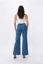 Load image into Gallery viewer, Kireina&#39;s again returned to their inspiration – the bold, adventurous &#39;70s - and paid extra attention to the details. The Harper Jean is their new classic wide-leg jean. Featuring front patch pockets and a high-rise, it hugs the figure with a slim hip and flares out gently for a truly flattering look. They’re made from their signature stretch denim so they’re the women’s jean that is as comfortable as it is stylish.

FEATURES:
- High Rise Wide Leg
- Average Inside Leg Length = 82cm
- Patch pockets front and
