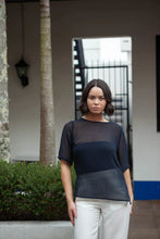 Load image into Gallery viewer, NES Zoe Top Ink. Semi-sheer, stylish floaty relaxed t-shirt style top.
Features: Curved front neckline and V back neck (can be reversed), even hem line, side splits
Composition: Poly Chiffon
