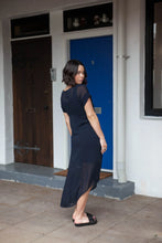 Load image into Gallery viewer, The NES Flow Dress is a multi-seasonal, versatile style that seamlessly transitions from casual to formal occasions. This dress offers a variety of styling options—wear it draped down across the front for a relaxed look, or cinch it up at the side using the adjustable side button and hem loopers for a more structured appearance. The perfect balance of comfort and elegance, this dress can be styled with our Lattice Slip
