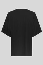 MSCH Kinsey Melea Tee in black by MSCH Copenhagen. Oversized organic cotton T-shirt with a round neckline, dropped shoulders and short sleeves for a relaxed boxy fit. Soft everyday staple in 100% organic cotton.