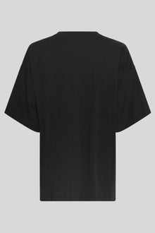 MSCH Kinsey Melea Tee in black by MSCH Copenhagen. Oversized organic cotton T-shirt with a round neckline, dropped shoulders and short sleeves for a relaxed boxy fit. Soft everyday staple in 100% organic cotton.