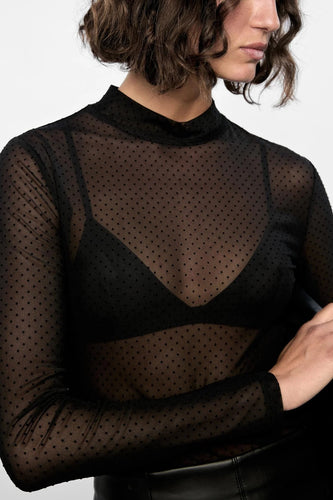The Kaia Spot Mesh Top is a statement sheer essential. Designed with subtle flocked spots and a fitted silhouette, it’s perfect for layering or wearing solo with confidence.

Lightweight sheer mesh High neckline
Flocked spot print
Long sleeves 
Fitted shape for easy layering
Our model is 175cm tall and wears a size Small
95% Polyester, 5% Elastane 

Designed in Sydney, Australia