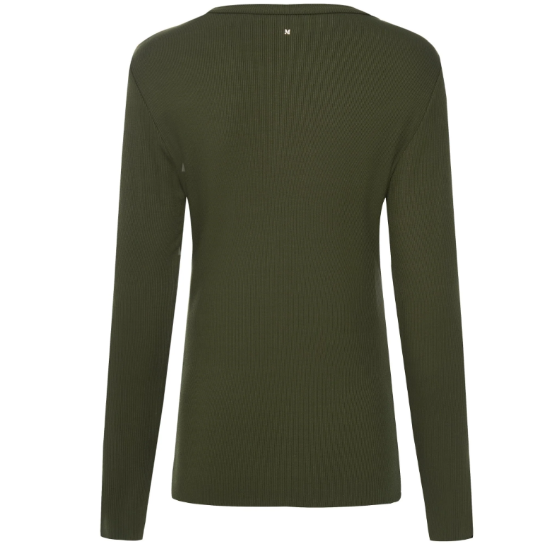 Lina by Moke women’s ribbed jersey top in a buttery soft double layered fabric for warmth, comfort, and confident coverage. Designed with a smooth, body skimming fit, round neckline, and long sleeves for effortless layering. Finished with subtle pale gold hardware at the back neck for a refined touch. An elevated everyday essential designed in New Zealand for polished, easy wear.