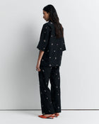 ROMY | JUNE SHIRT

Oversized short sleeve shirt with concealed placket and exaggerated sleeves. Finished with delicate floral embroidery for a subtle romantic touch.

Model is a size AU8 and wears a size S

Composition: 70% Cotton, 30% Silk