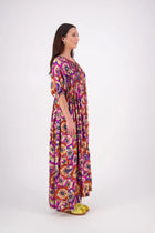 The N-E-S Leah Dress is a full-length maxi designed for elegant ease. It features a subtle bubble sleeve, V-neckline with a 2-button loop placket, and delicate pin pleat detailing at the front. A softly gathered, elasticated back and diagonal seam create fullness through the skirt for floaty movement. Finished with a cotton-lined skirt and side seam pockets, it’s a beautifully balanced blend of comfort and style.
viscoes sateen georgette. Designed 
and made in NZ