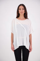  The N-E-S Luna Top – A New Take on Sheer Simplicity
The Luna Top is a modern evolution of a NES favourite. Crafted with exposed French seams on the outside, an angled front seam, and a left-side split for added movement, this sheer layer brings elevated ease to any outfit. Style it over a NES lattice singlet or your favourite base – the Luna Top is designed for effortless layering with a refined edge.
polyester chiffon
designed & made in NZ