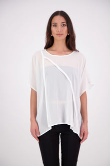  The N-E-S Luna Top – A New Take on Sheer Simplicity
The Luna Top is a modern evolution of a NES favourite. Crafted with exposed French seams on the outside, an angled front seam, and a left-side split for added movement, this sheer layer brings elevated ease to any outfit. Style it over a NES lattice singlet or your favourite base – the Luna Top is designed for effortless layering with a refined edge.
polyester chiffon
designed & made in NZ