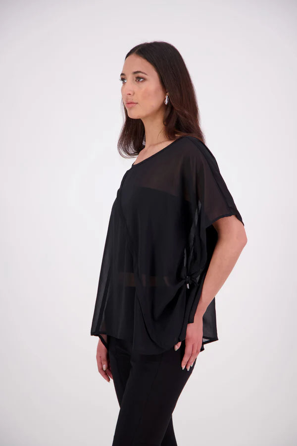  The N-E-S Luna Top – A New Take on Sheer Simplicity
The Luna Top is a modern evolution of a NES favourite. Crafted with exposed French seams on the outside, an angled front seam, and a left-side split for added movement, this sheer layer brings elevated ease to any outfit. Style it over a NES lattice singlet or your favourite base – the Luna Top is designed for effortless layering with a refined edge.
polyester chiffon
designed & made in NZ